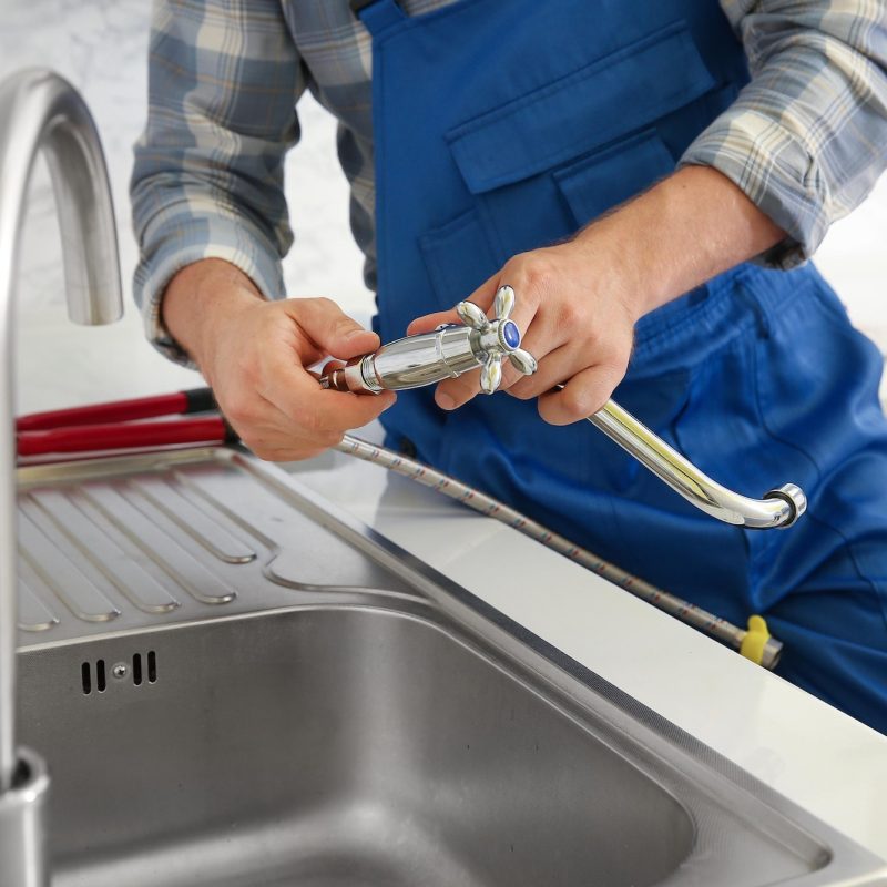 kitchen-sink-install-concept-creative-photo-about-plumber-installing-sink-in-kitchen-interior-1-1.jpg